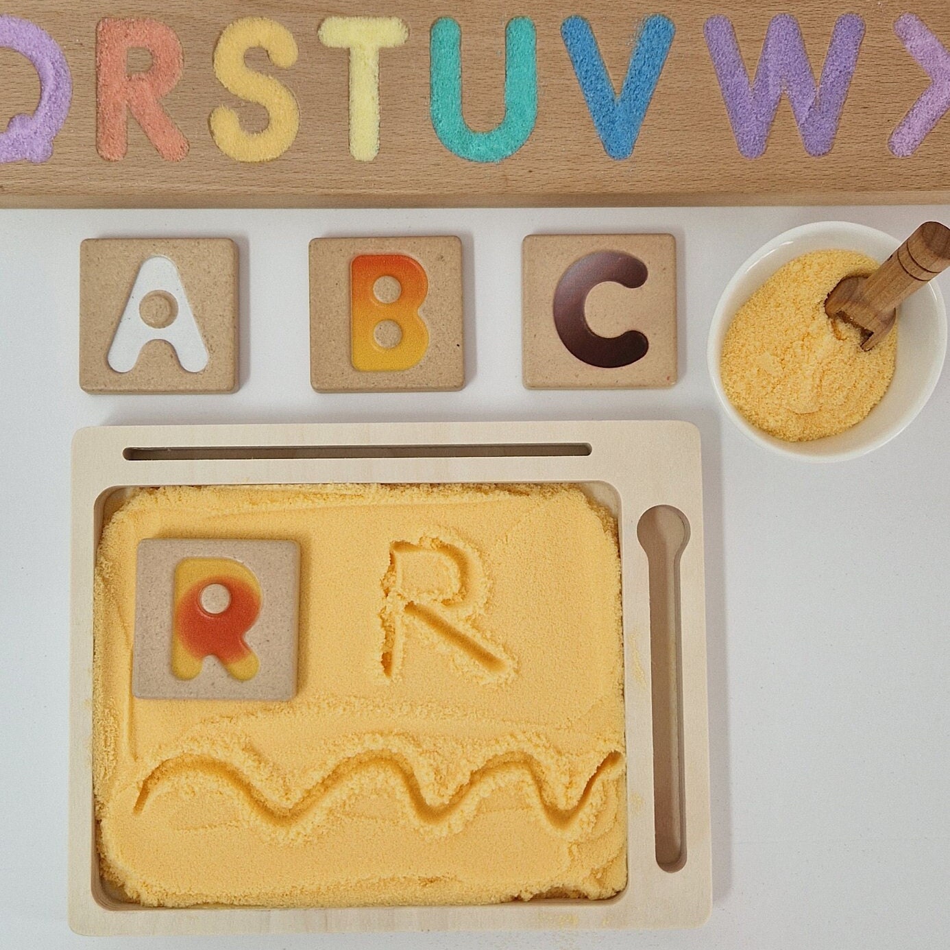 Orange Coloured Salt for Mark Making and Writing Practice