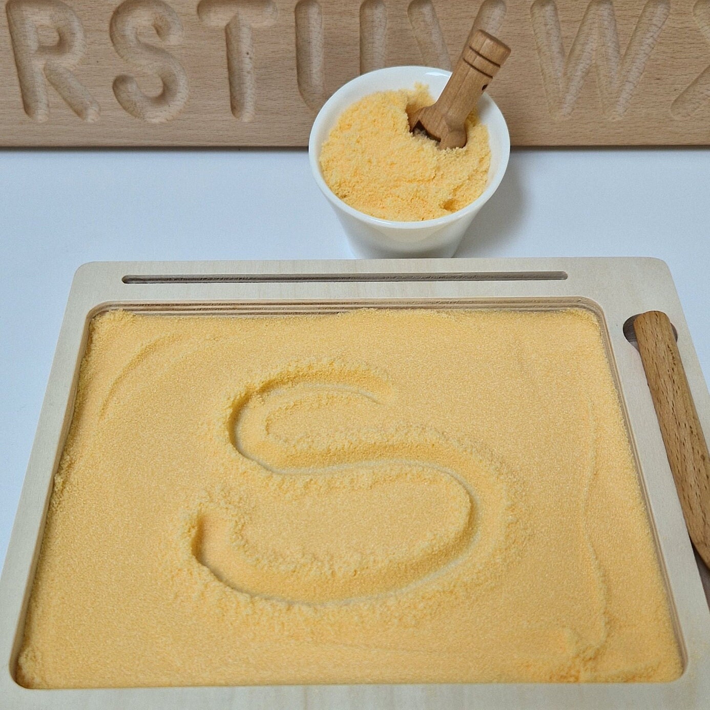 Orange Coloured Salt for Mark Making and Writing Practice